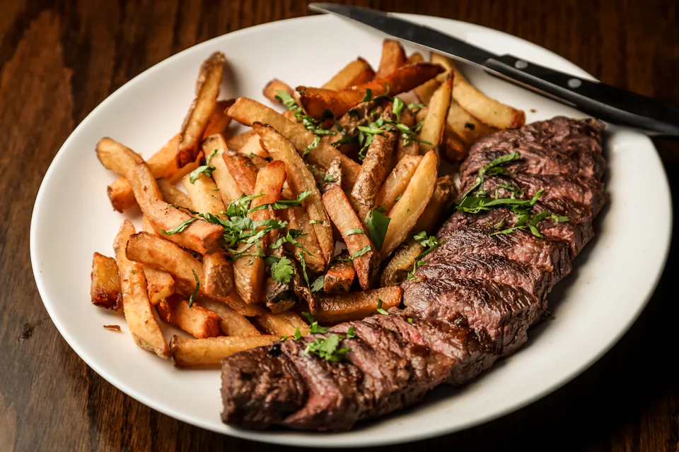 Steak and fries on a plate